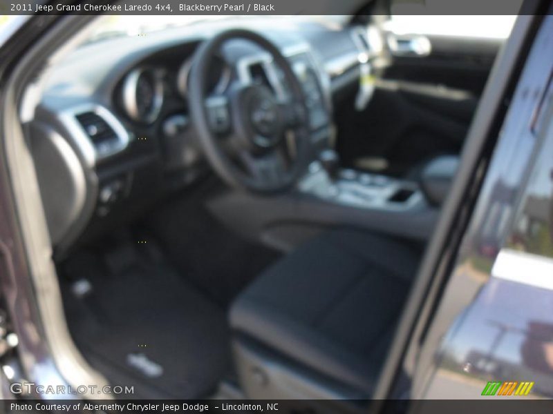 Blackberry Pearl / Black 2011 Jeep Grand Cherokee Laredo 4x4