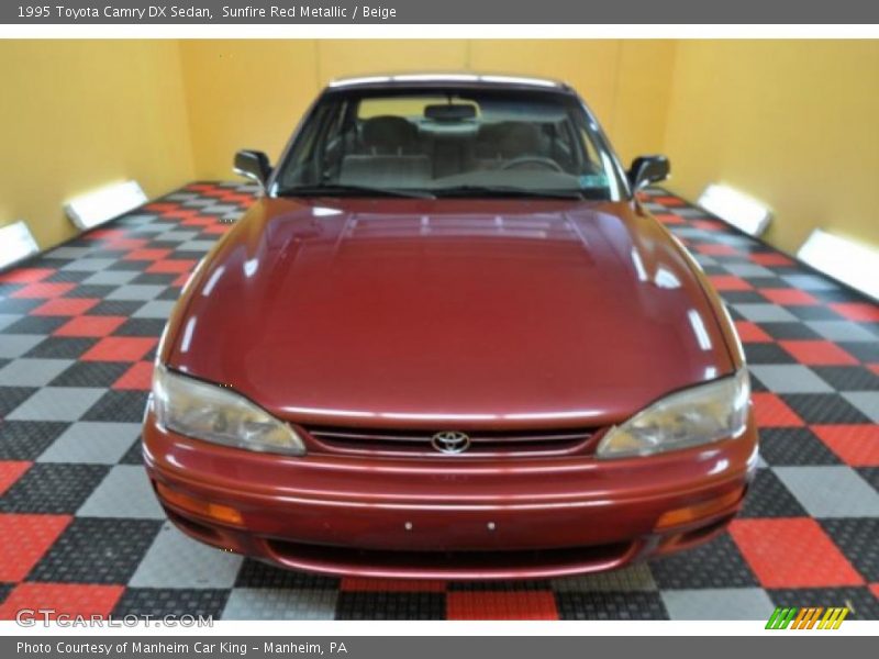 Sunfire Red Metallic / Beige 1995 Toyota Camry DX Sedan