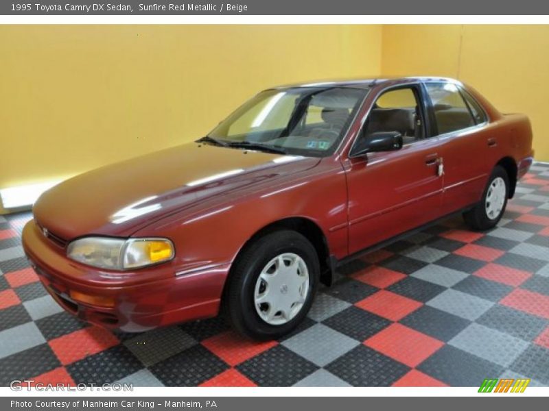 Sunfire Red Metallic / Beige 1995 Toyota Camry DX Sedan