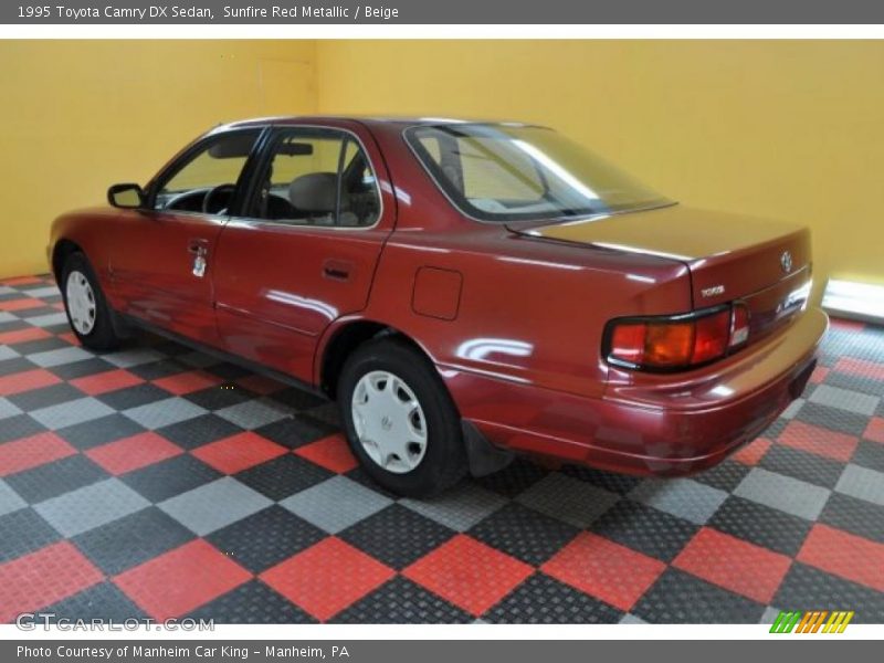 Sunfire Red Metallic / Beige 1995 Toyota Camry DX Sedan