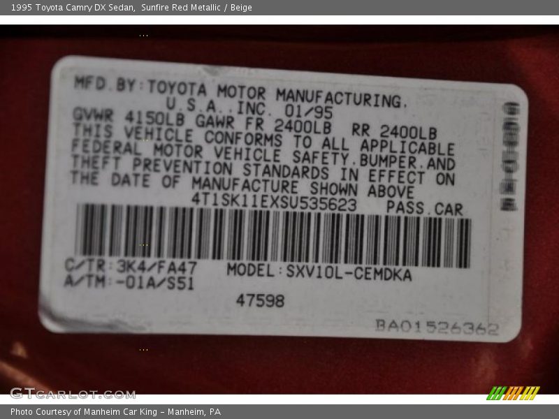 Sunfire Red Metallic / Beige 1995 Toyota Camry DX Sedan