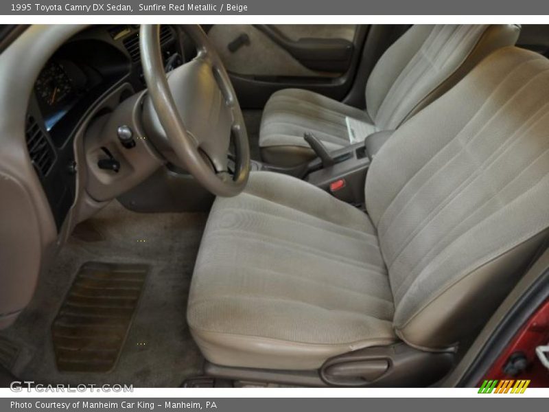 Sunfire Red Metallic / Beige 1995 Toyota Camry DX Sedan