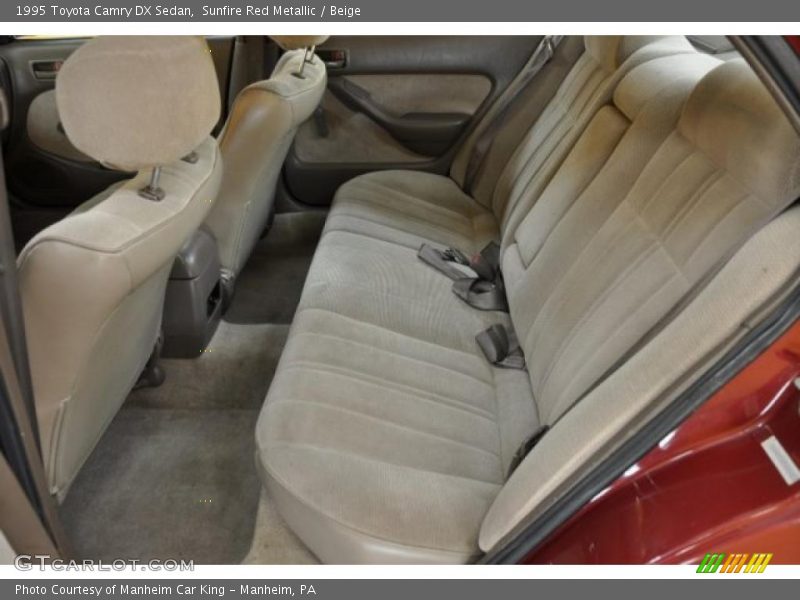 Sunfire Red Metallic / Beige 1995 Toyota Camry DX Sedan