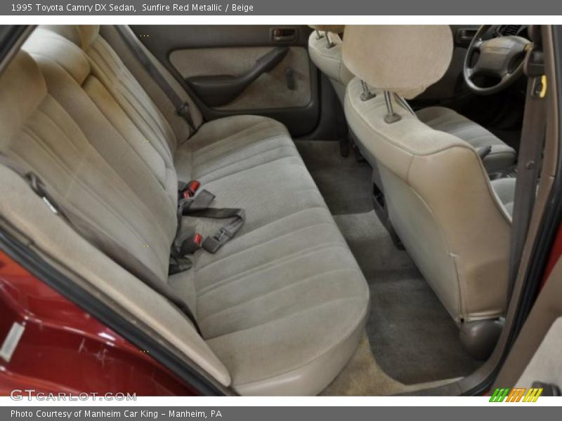Sunfire Red Metallic / Beige 1995 Toyota Camry DX Sedan
