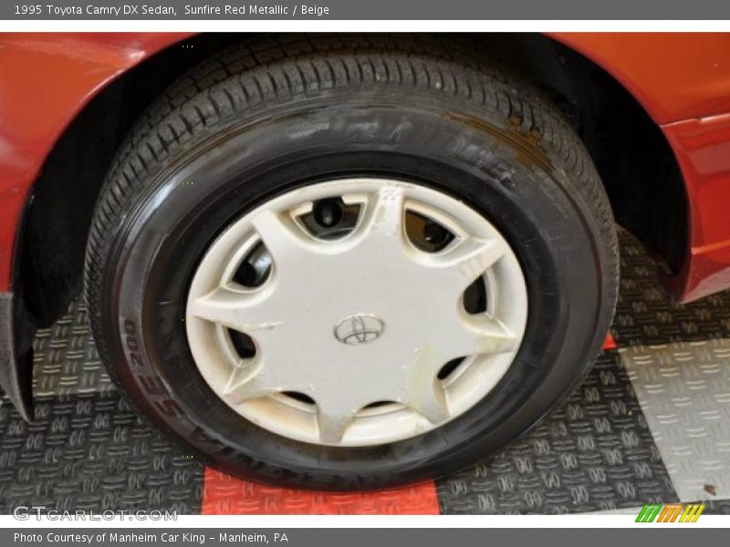 Sunfire Red Metallic / Beige 1995 Toyota Camry DX Sedan