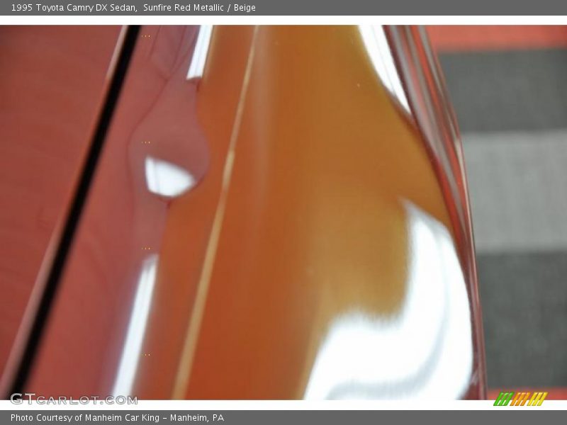 Sunfire Red Metallic / Beige 1995 Toyota Camry DX Sedan