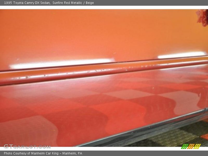 Sunfire Red Metallic / Beige 1995 Toyota Camry DX Sedan