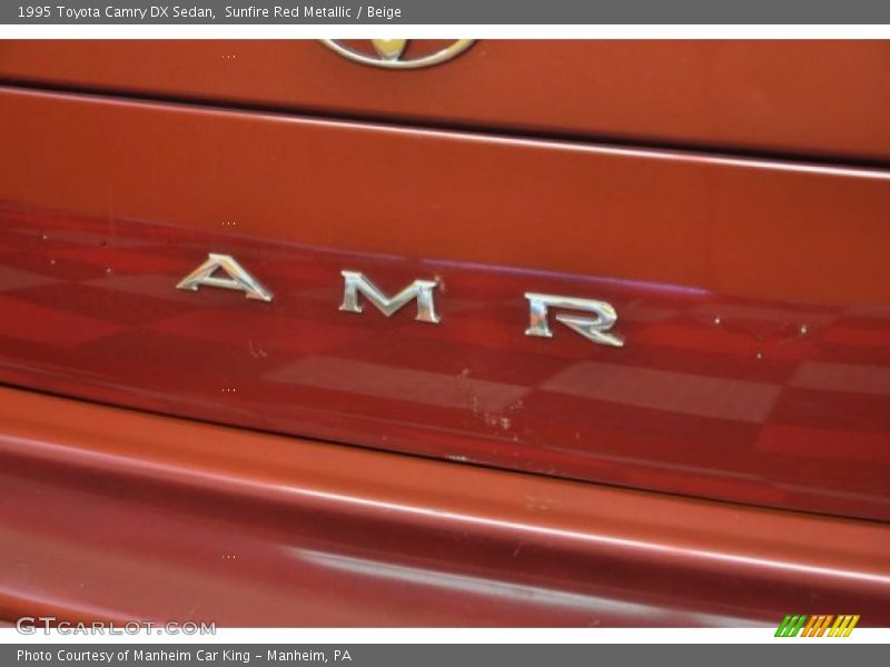 Sunfire Red Metallic / Beige 1995 Toyota Camry DX Sedan