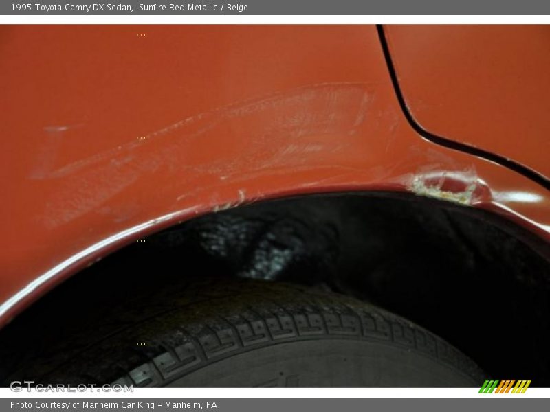 Sunfire Red Metallic / Beige 1995 Toyota Camry DX Sedan