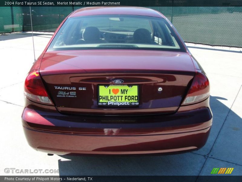 Merlot Metallic / Medium Parchment 2004 Ford Taurus SE Sedan