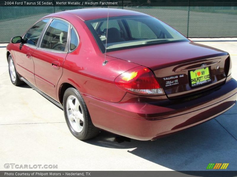 Merlot Metallic / Medium Parchment 2004 Ford Taurus SE Sedan