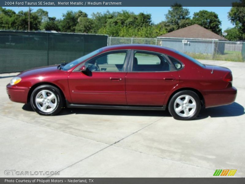 Merlot Metallic / Medium Parchment 2004 Ford Taurus SE Sedan
