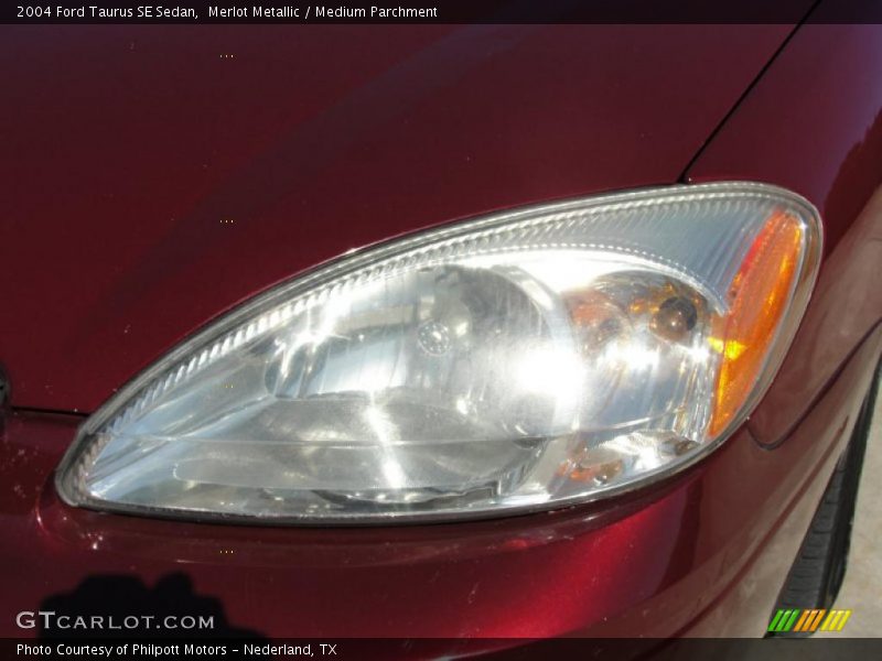 Merlot Metallic / Medium Parchment 2004 Ford Taurus SE Sedan