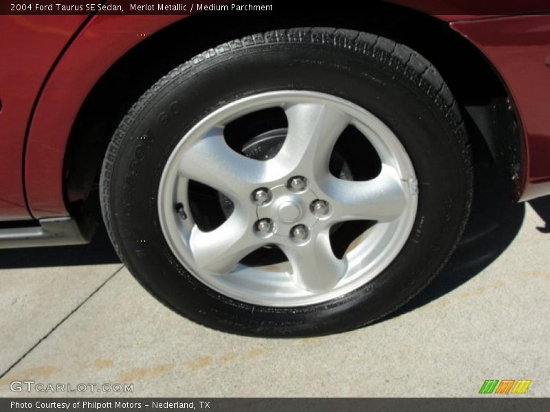 Merlot Metallic / Medium Parchment 2004 Ford Taurus SE Sedan