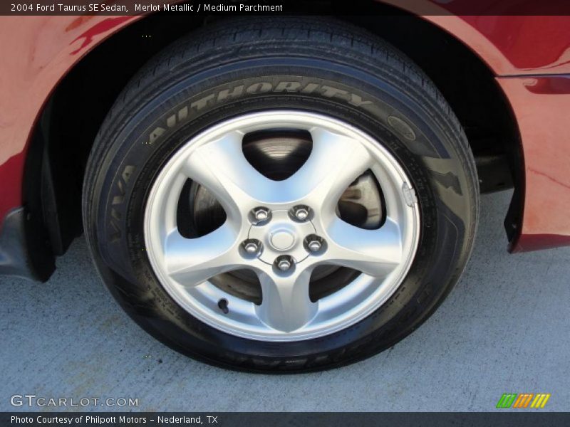 Merlot Metallic / Medium Parchment 2004 Ford Taurus SE Sedan