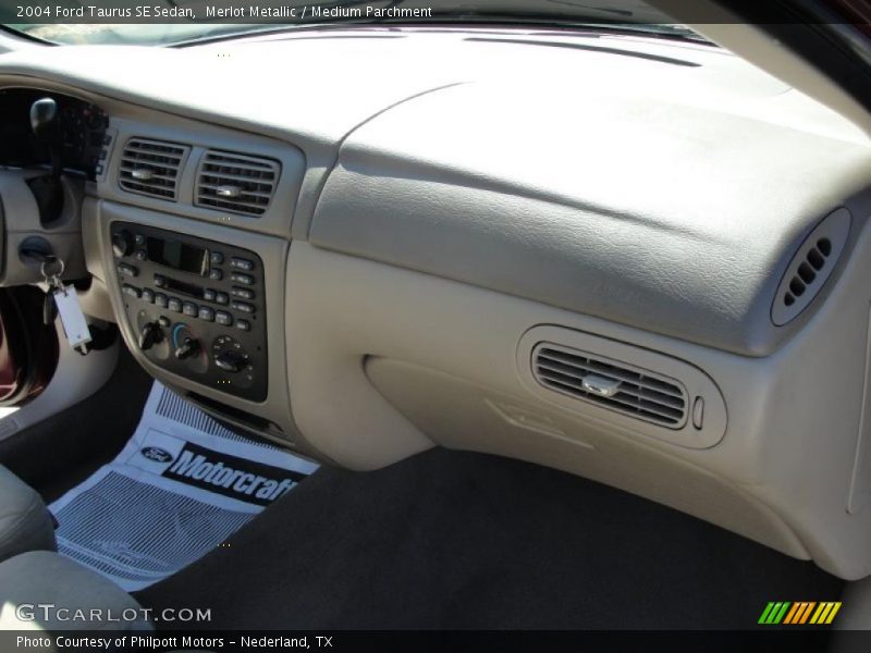 Merlot Metallic / Medium Parchment 2004 Ford Taurus SE Sedan