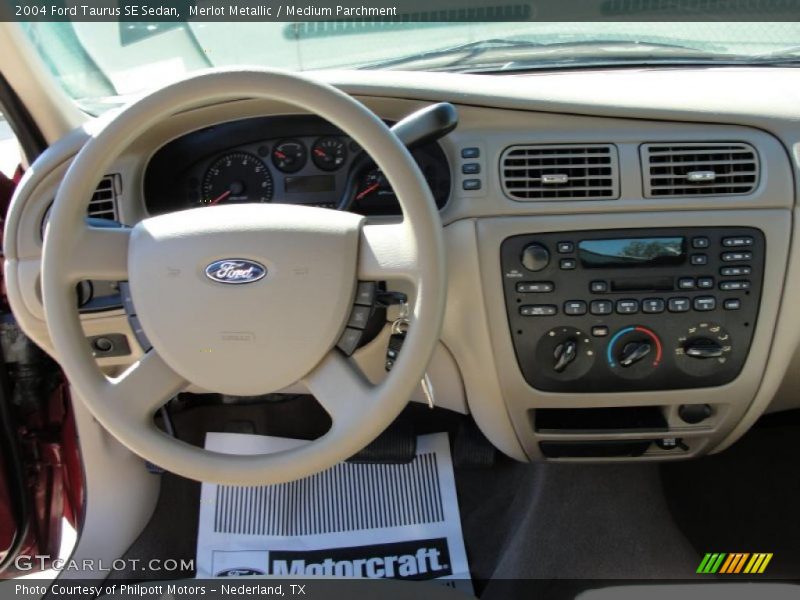 Merlot Metallic / Medium Parchment 2004 Ford Taurus SE Sedan