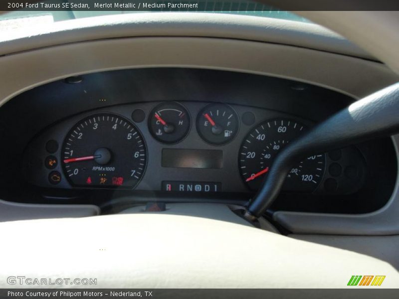 Merlot Metallic / Medium Parchment 2004 Ford Taurus SE Sedan