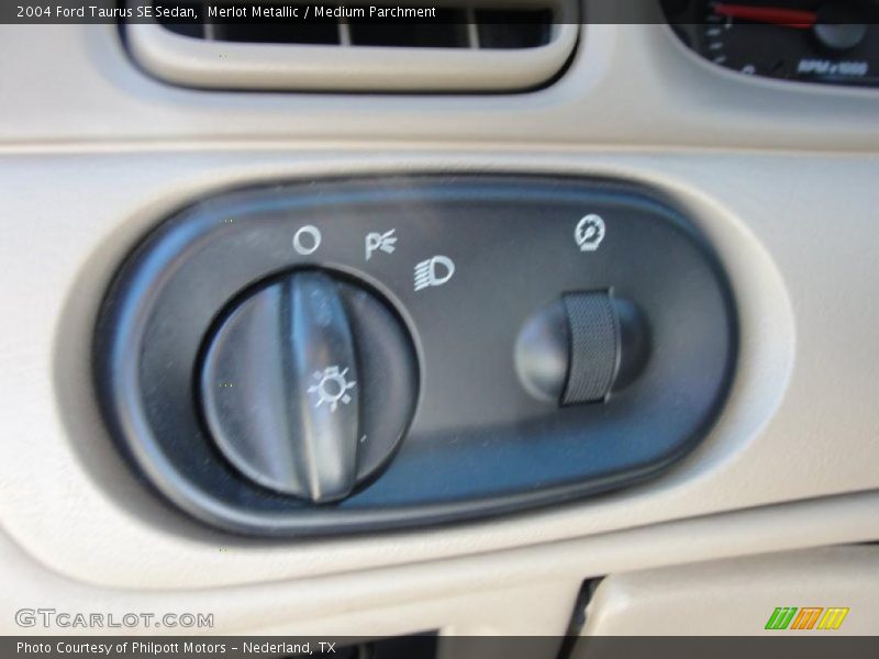 Merlot Metallic / Medium Parchment 2004 Ford Taurus SE Sedan