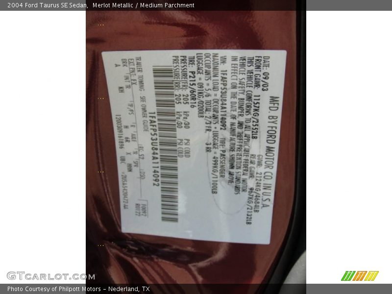 Merlot Metallic / Medium Parchment 2004 Ford Taurus SE Sedan