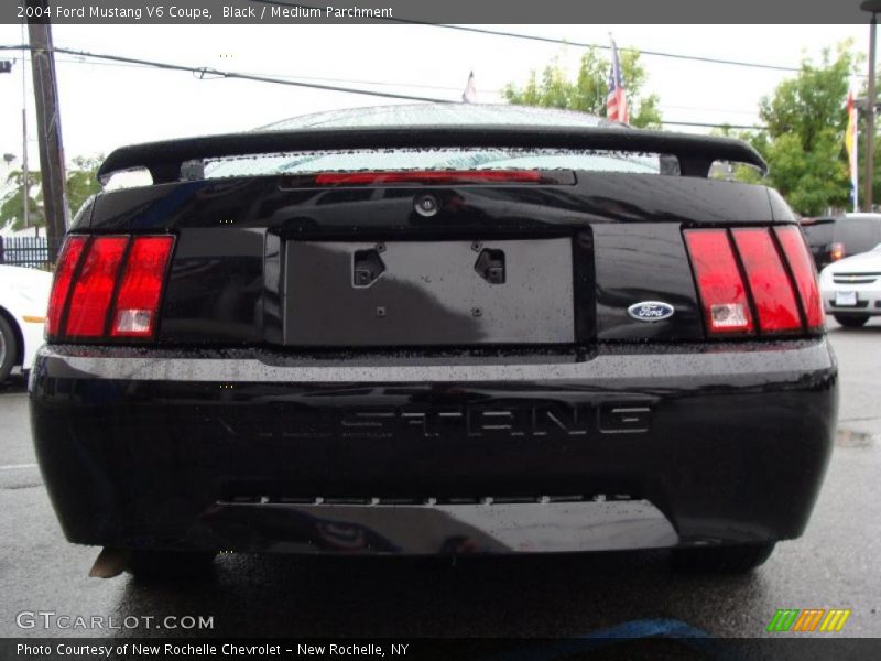 Black / Medium Parchment 2004 Ford Mustang V6 Coupe