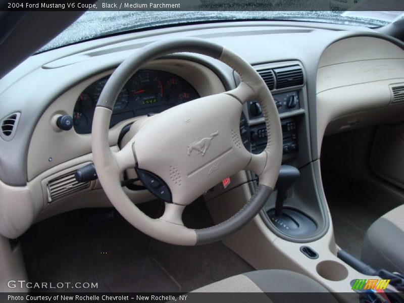 Black / Medium Parchment 2004 Ford Mustang V6 Coupe