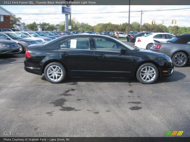 Tuxedo Black Metallic / Medium Light Stone 2011 Ford Fusion SEL