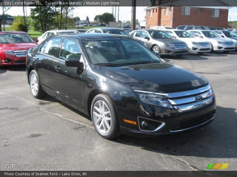 Tuxedo Black Metallic / Medium Light Stone 2011 Ford Fusion SEL