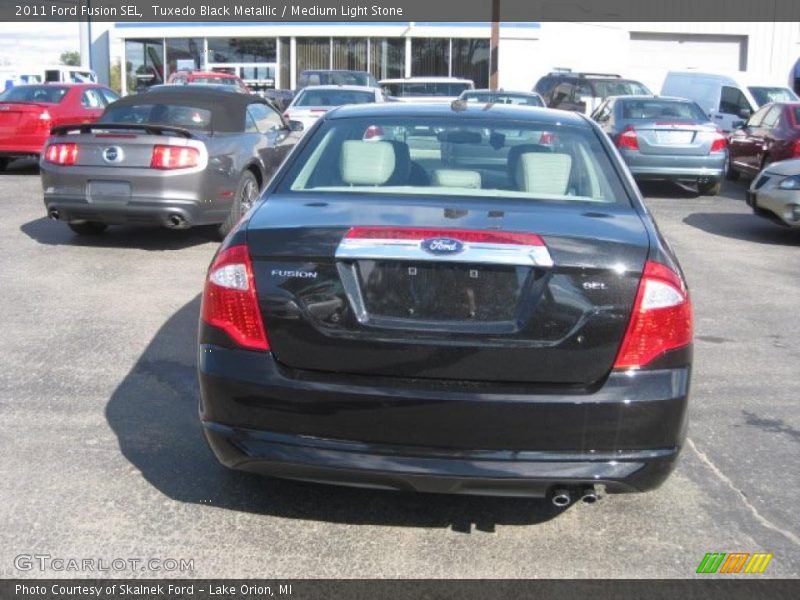 Tuxedo Black Metallic / Medium Light Stone 2011 Ford Fusion SEL
