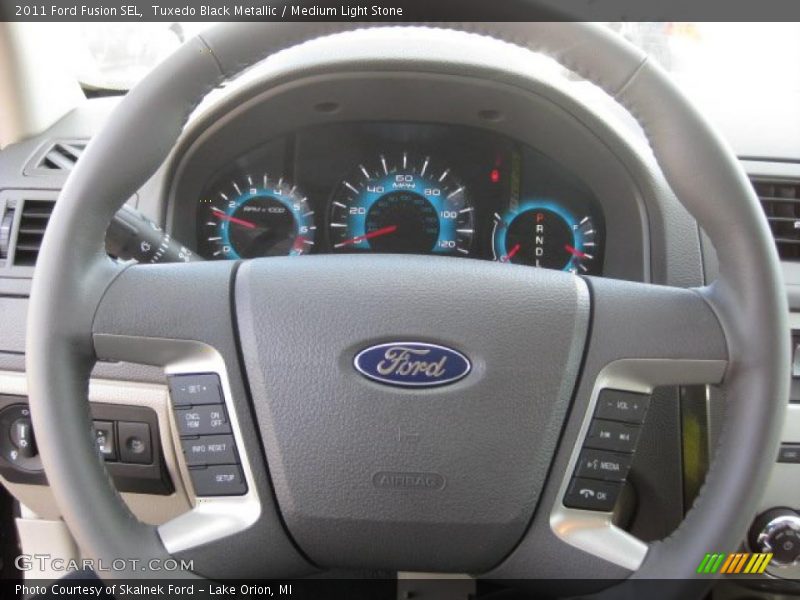 Tuxedo Black Metallic / Medium Light Stone 2011 Ford Fusion SEL