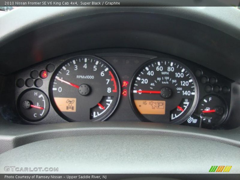 Super Black / Graphite 2010 Nissan Frontier SE V6 King Cab 4x4