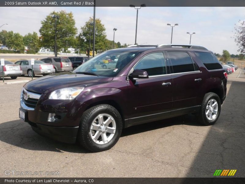 Garnet Red / Black 2009 Saturn Outlook XR AWD