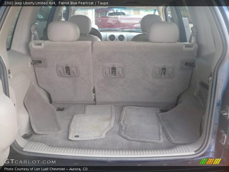 Patriot Blue Pearlcoat / Taupe 2002 Jeep Liberty Limited 4x4
