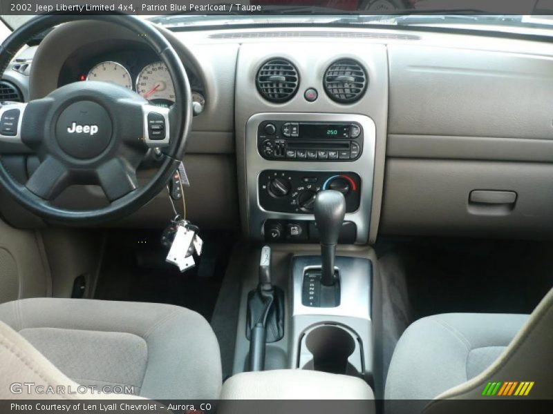 Patriot Blue Pearlcoat / Taupe 2002 Jeep Liberty Limited 4x4