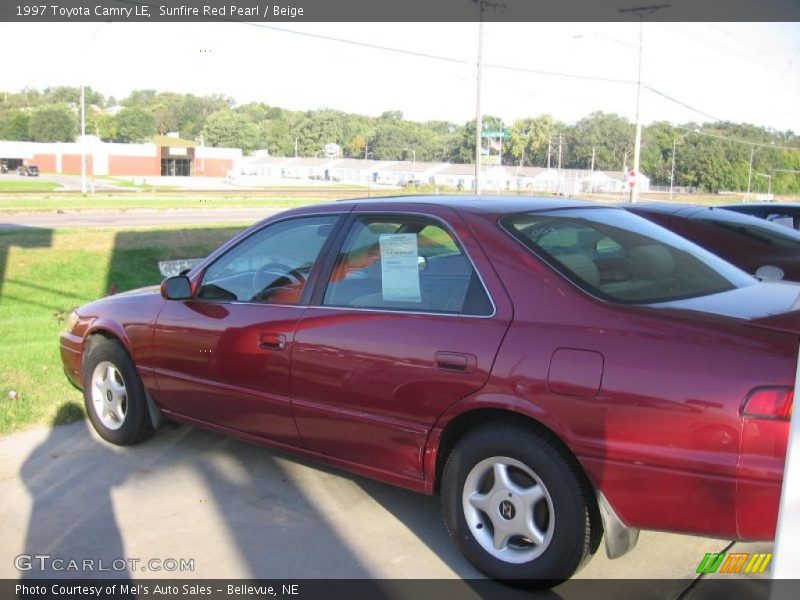 Sunfire Red Pearl / Beige 1997 Toyota Camry LE