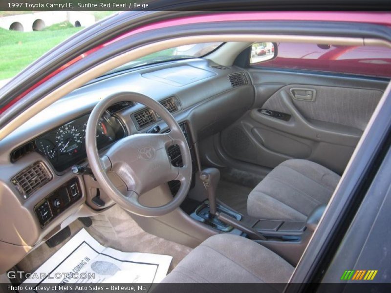 Sunfire Red Pearl / Beige 1997 Toyota Camry LE