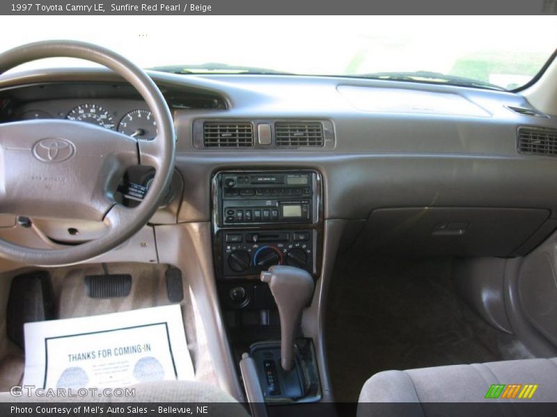 Sunfire Red Pearl / Beige 1997 Toyota Camry LE