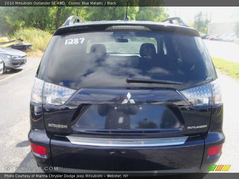 Cosmic Blue Metallic / Black 2010 Mitsubishi Outlander SE 4WD