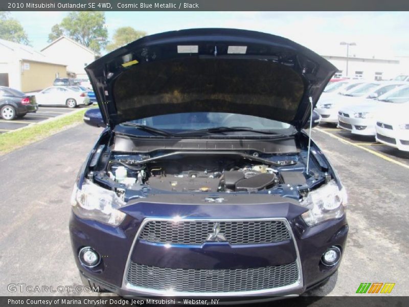 Cosmic Blue Metallic / Black 2010 Mitsubishi Outlander SE 4WD