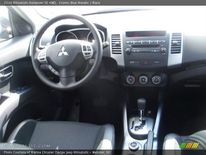 Cosmic Blue Metallic / Black 2010 Mitsubishi Outlander SE 4WD