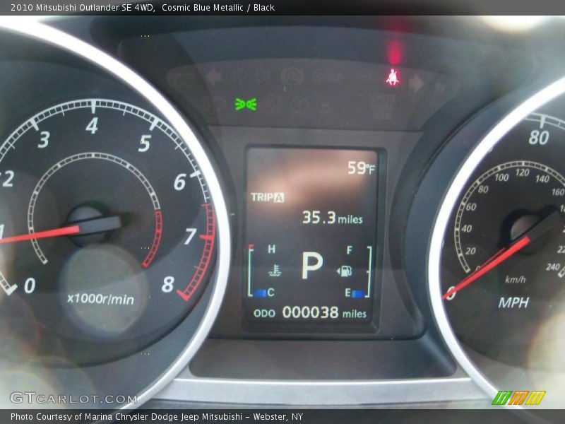 Cosmic Blue Metallic / Black 2010 Mitsubishi Outlander SE 4WD