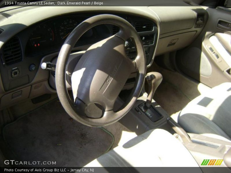 Dark Emerald Pearl / Beige 1994 Toyota Camry LE Sedan