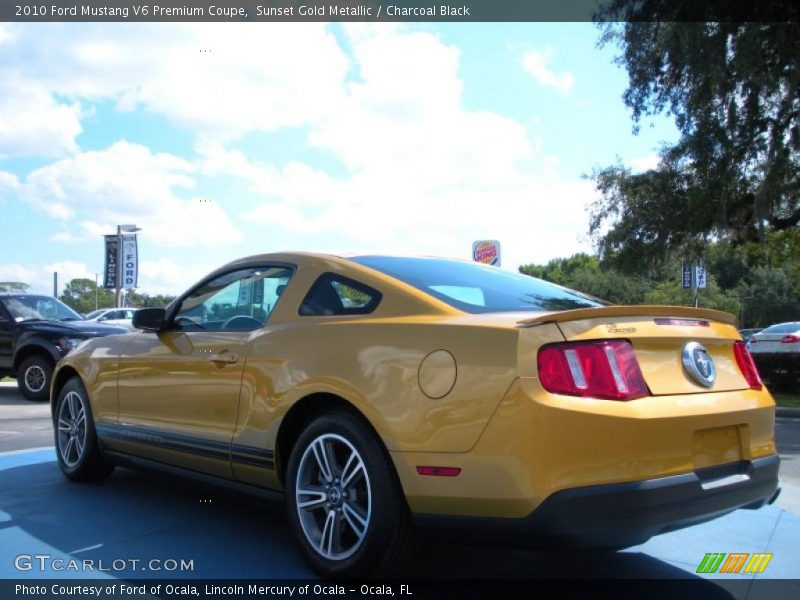 Sunset Gold Metallic / Charcoal Black 2010 Ford Mustang V6 Premium Coupe