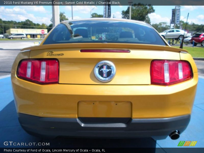 Sunset Gold Metallic / Charcoal Black 2010 Ford Mustang V6 Premium Coupe