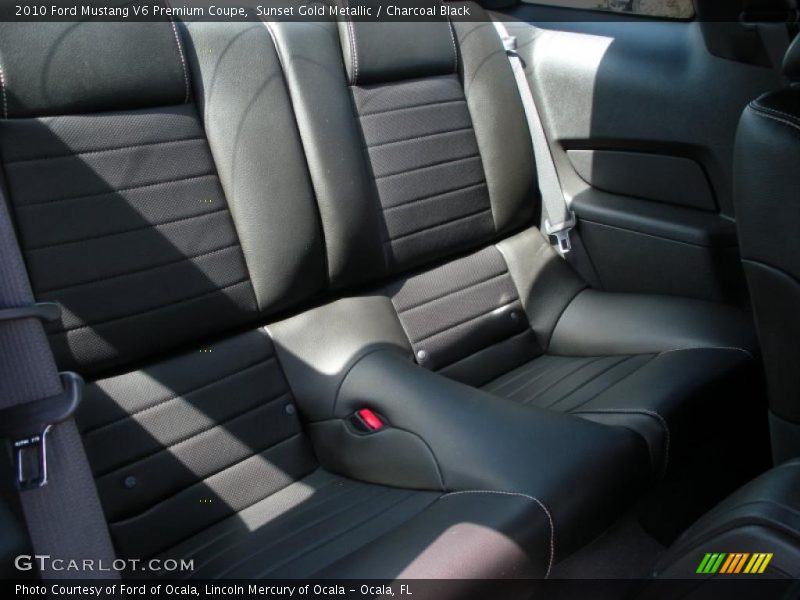 Sunset Gold Metallic / Charcoal Black 2010 Ford Mustang V6 Premium Coupe