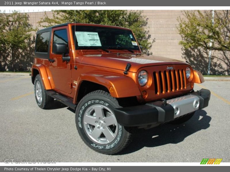 Mango Tango Pearl / Black 2011 Jeep Wrangler Sahara 4x4