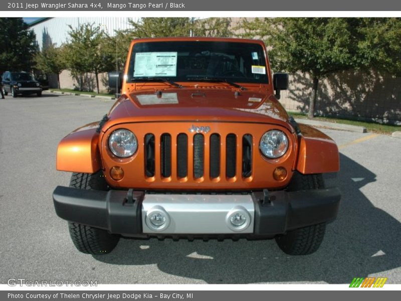 Mango Tango Pearl / Black 2011 Jeep Wrangler Sahara 4x4