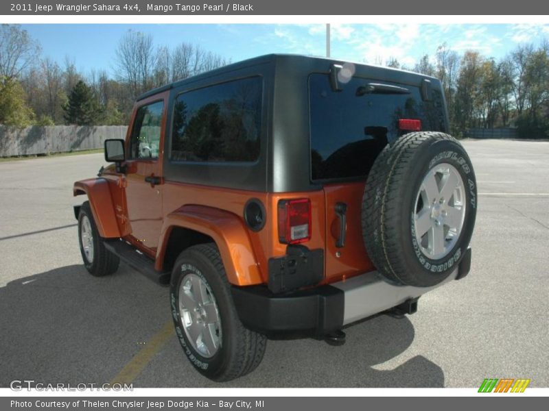 Mango Tango Pearl / Black 2011 Jeep Wrangler Sahara 4x4