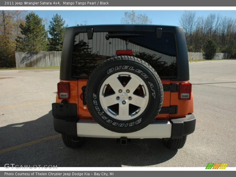 Mango Tango Pearl / Black 2011 Jeep Wrangler Sahara 4x4