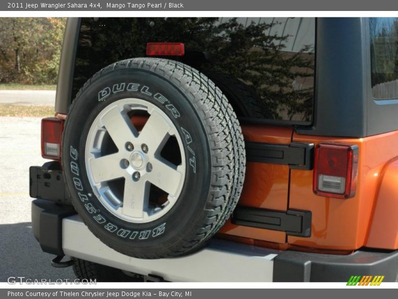 Mango Tango Pearl / Black 2011 Jeep Wrangler Sahara 4x4